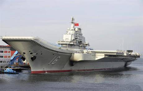 Chinese Military first aircraft carrier with fighters show of force in Yellow Sea