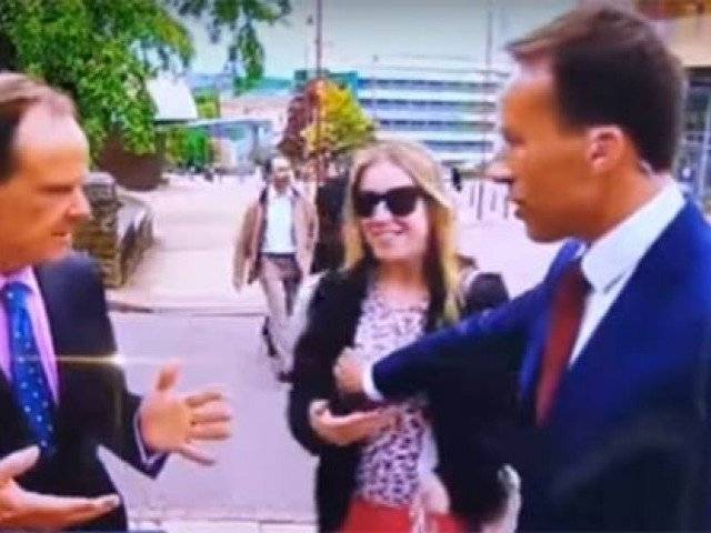 BBC reporter slapped live on air for an act of indecency with woman