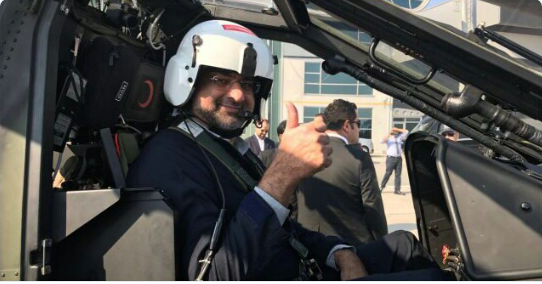 Pakistan PM Shahid Khaqan takes a ride at Turkish Military Combat Helicopter T-129