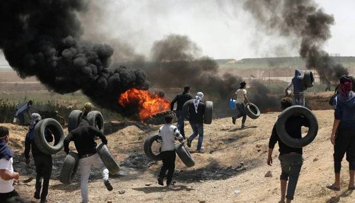 Israeli Military martyrs 12 Palestinians and wound over hundred