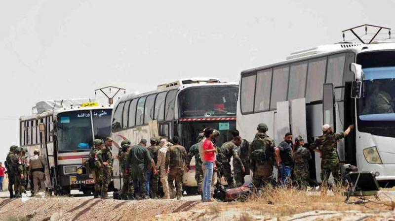 Syrian rebels start pull-out from south Damascus