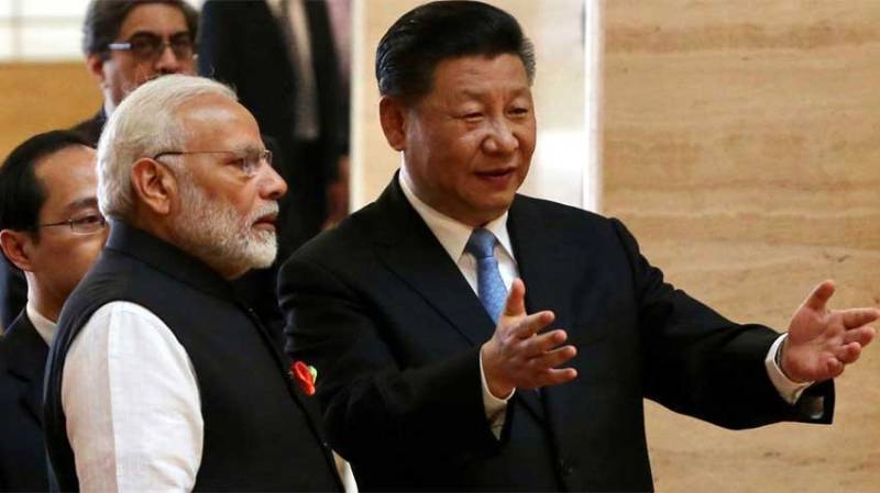 China condemns Modi’s visit to disputed northeastern border