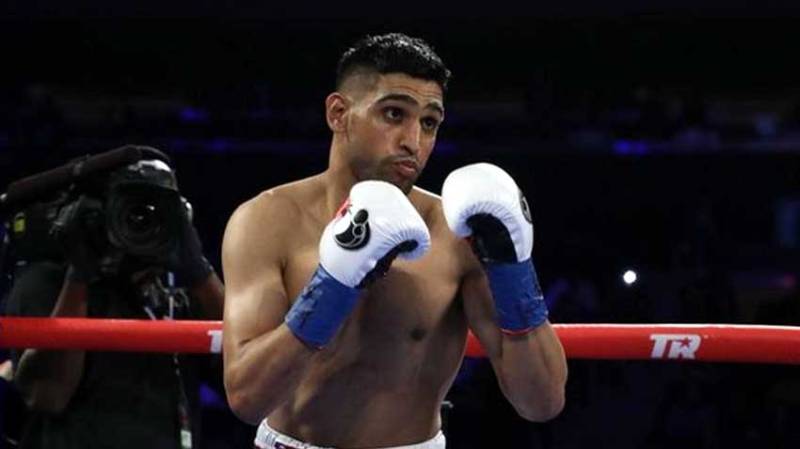 British-Pakistani boxer Amir Khan wins WBC international welterweight title