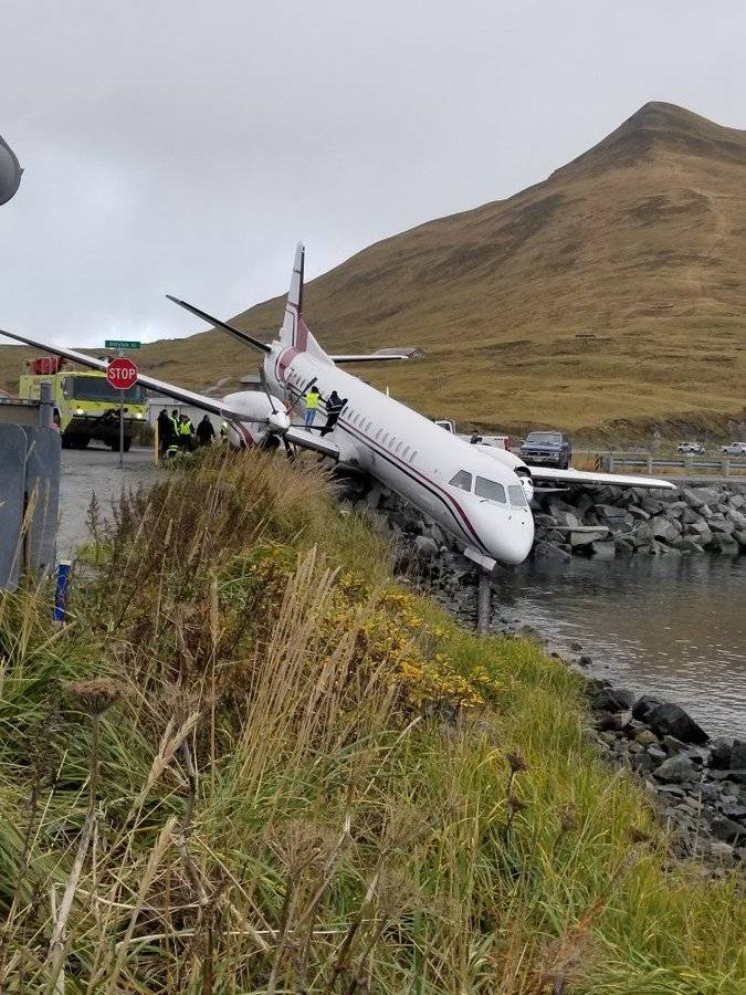 Passenger plane crashed into pond while landing