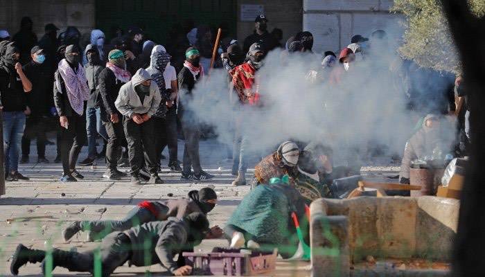 Israeli forces raid Al Aqsa mosque injuring over 100 Palestinians