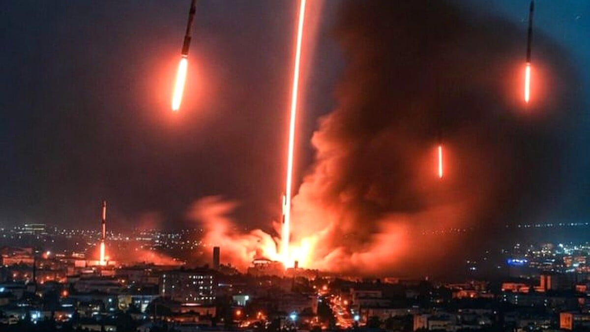 Sirens across 100 Israeli towns as Iran and Hezbollah missile rocket and drone barrage hit Israel